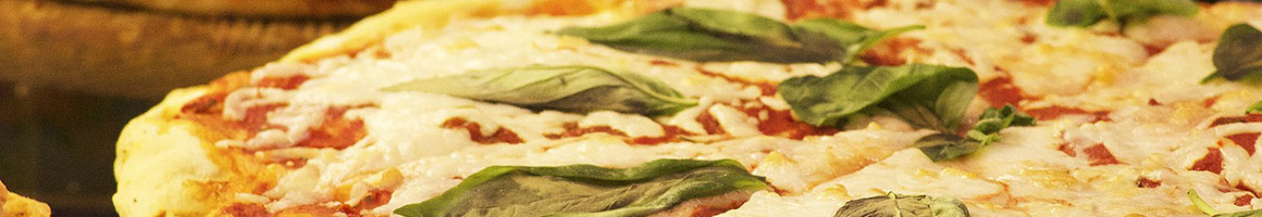 Eating Italian Pizza at Rossini's Italian Restaurant restaurant in East Hampton, CT.